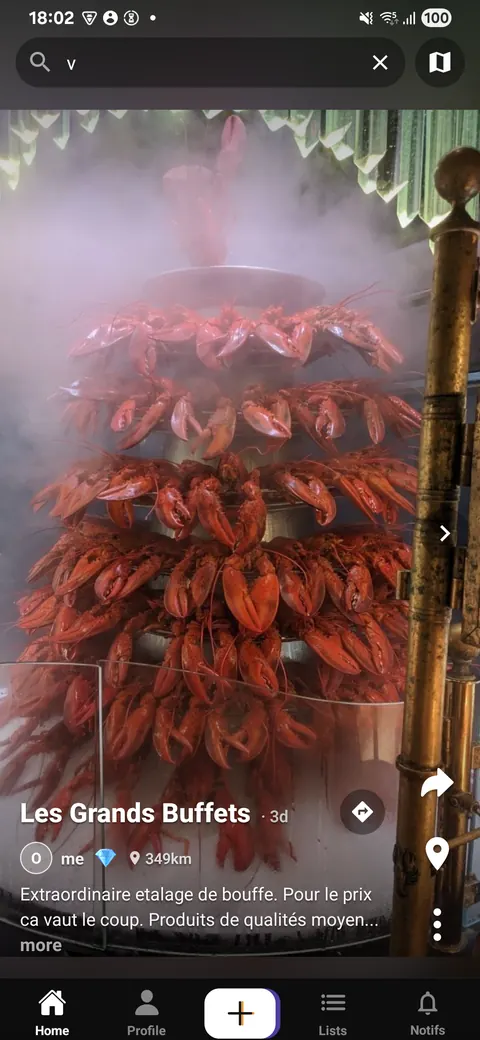 A full-screen review of Les Grands Buffets over a photo of a tower of steamed lobsters, the note and distance laid over the image.
